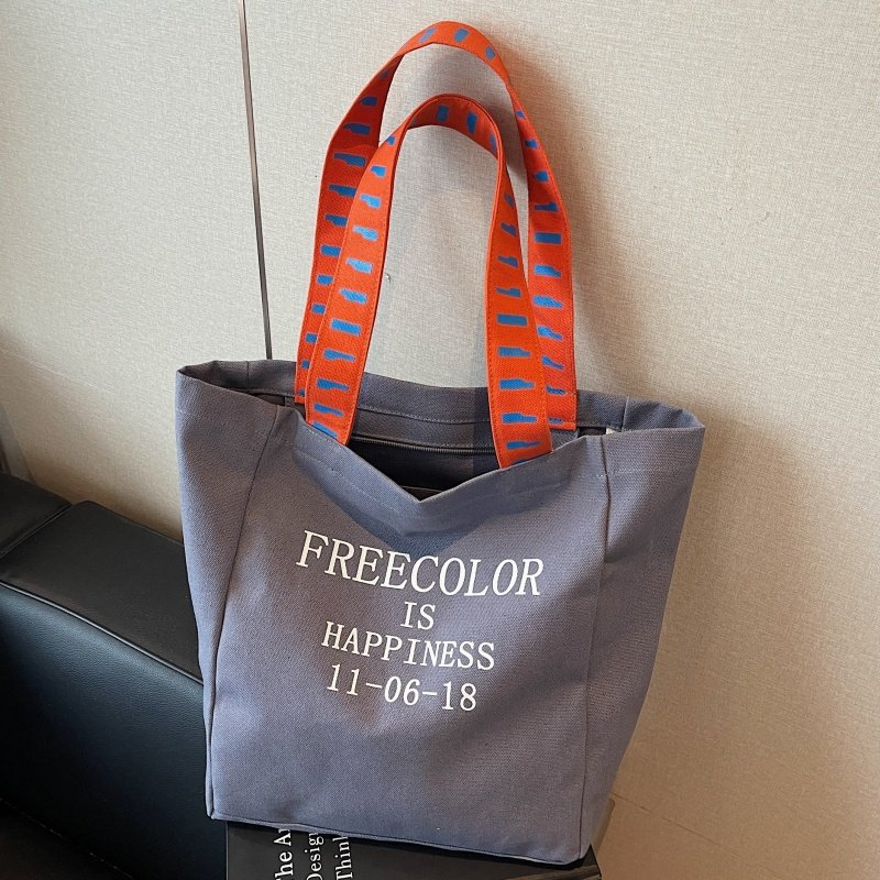 字母帆布包包女大容量学生上课通勤手提袋秋冬小众百搭单肩托特包,淘宝优惠券,粉丝福利购,淘宝优惠卷