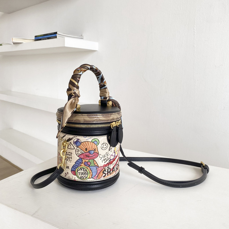 原创水桶包包女2025新款涂鸦发财圆筒包高级感手提女包斜挎包小包,淘宝优惠券,粉丝福利购,淘宝优惠卷