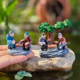 Large and small chess-playing old man figure ornaments