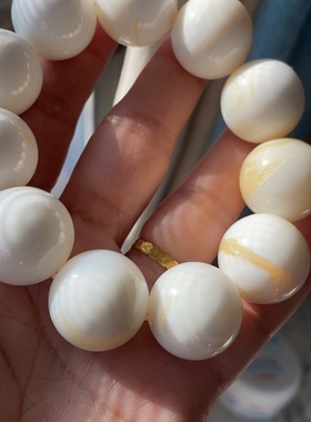 天然深海无瑕疵白贝壳珠手串精挑金丝贝壳手链20 mm。