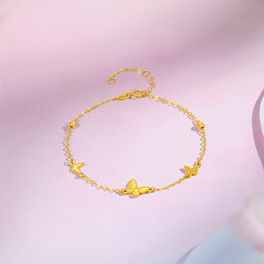 周六福黄18K金手链女蝴蝶结多彩金Au750圣诞礼物送女友