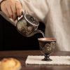 Kung Fu tea set gold and silver mixed with black lion dance ball