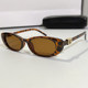 Punk-style cat-eye sunglasses with diamond letters and concave shape