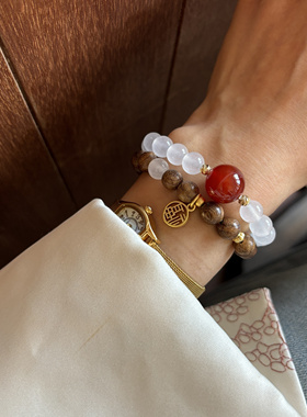 红玛瑙金丝楠木搭象牙果醒狮手链