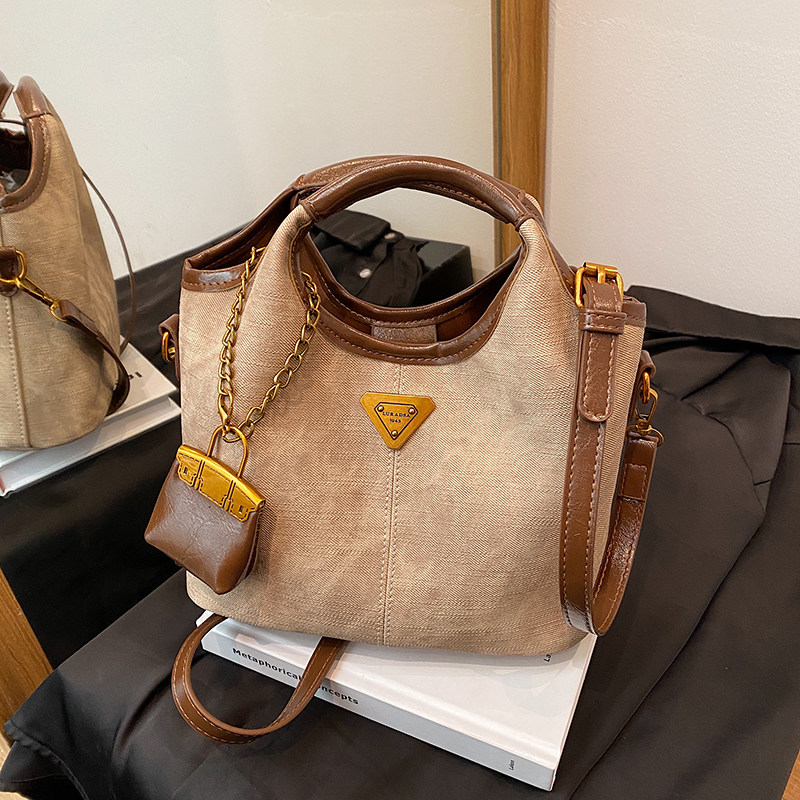 手提菜篮子水桶包包女2025新款高端大气轻奢小众高级感通勤斜挎包,淘宝优惠券,粉丝福利购,淘宝优惠卷