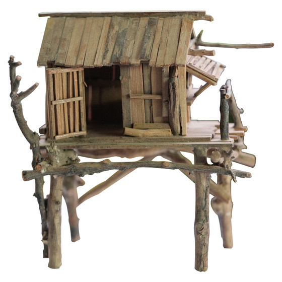 Small bamboo house making materials: wrapped bamboo sticks, bamboo skewers and wooden sticks