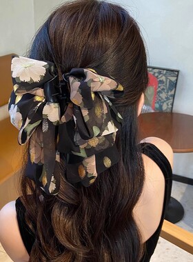 超仙碎花蝴蝶结飘带抓夹女