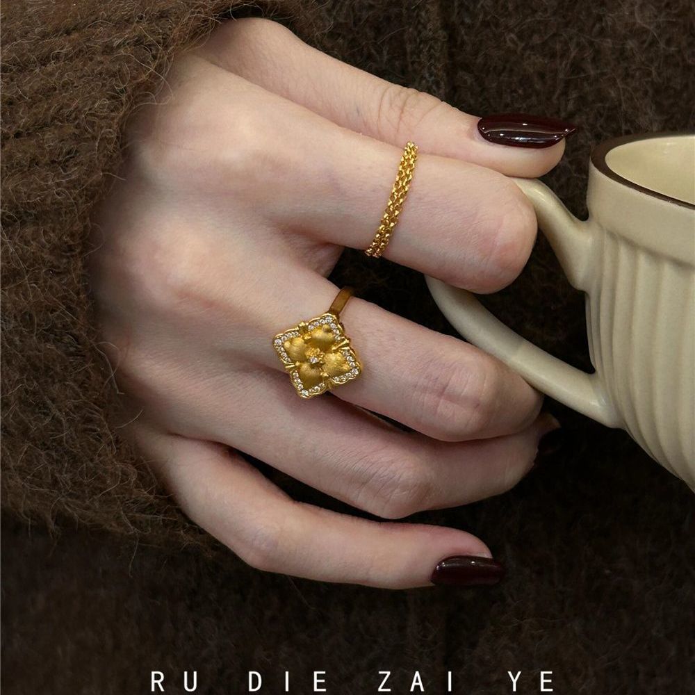 Kuning vintage middle-aged cloth Qifeng four-leaf ring light luxury high-end pull adjustable autumn and winter ring