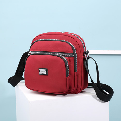 斜挎牛津布女包轻便妈妈包防水尼龙包包新款2025网红多层单肩小包 - 图0