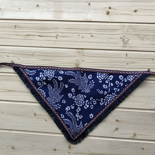 Square dance performance by tea-picking girls in ethnic headscarves