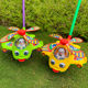 Baby dragging toddler plane toys
