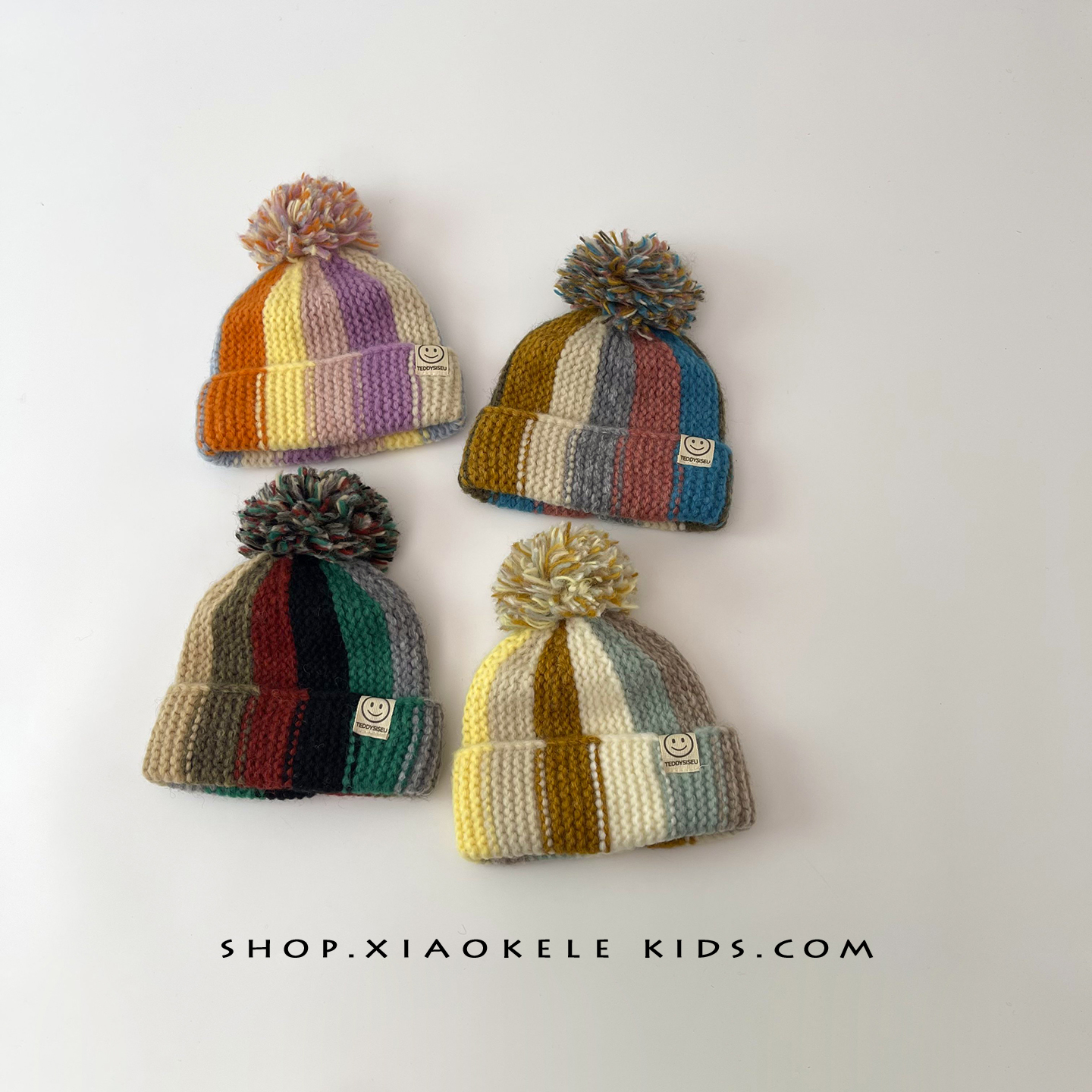 宝宝彩虹帽子男女童秋冬保暖防寒针织套头帽潮童时尚撞色毛球冷帽 - 图0