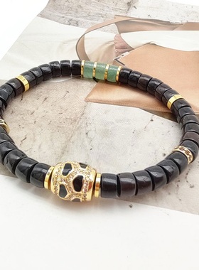 椰蒂直切黑金寿喜玉石盘玩手串