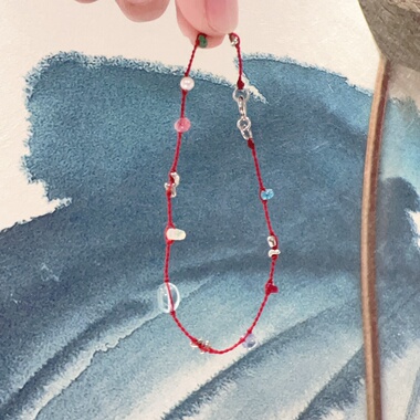 极细绳编小红绳手链红宝石祖母绿