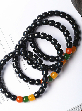 新疆料墨玉直切桶珠搭配款手链