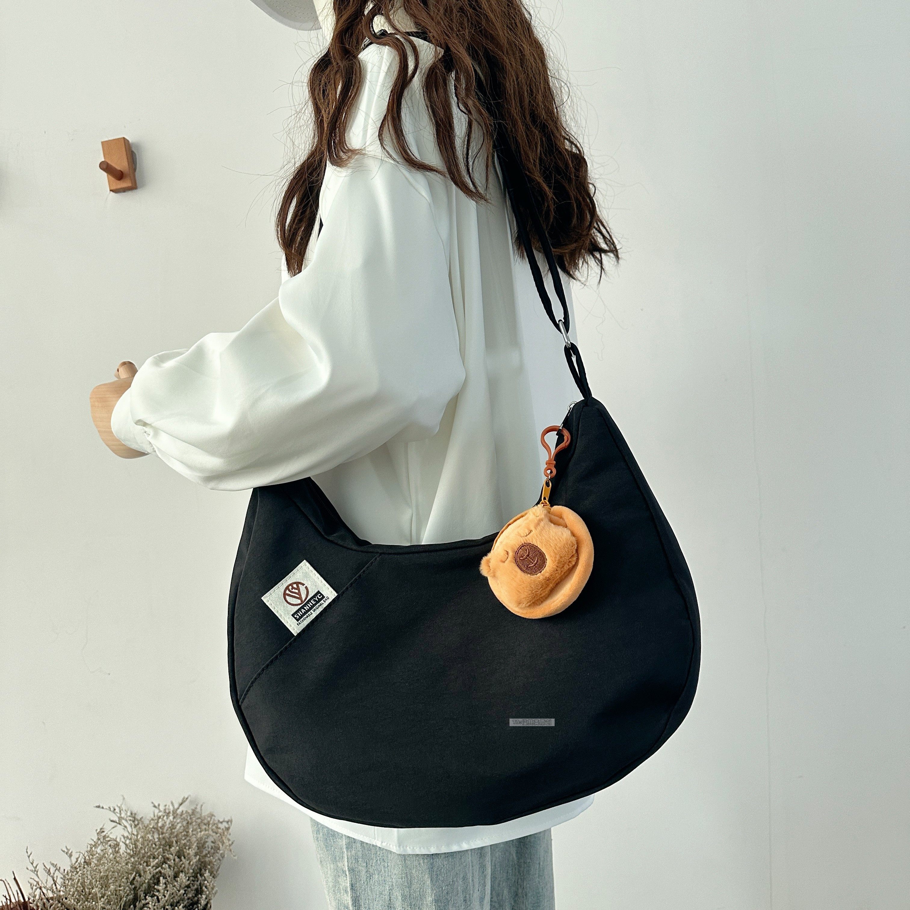 日系饺子包帆布包女时尚流行单肩包简约百搭通勤斜挎包上课书包袋,淘宝优惠券,粉丝福利购,淘宝优惠卷