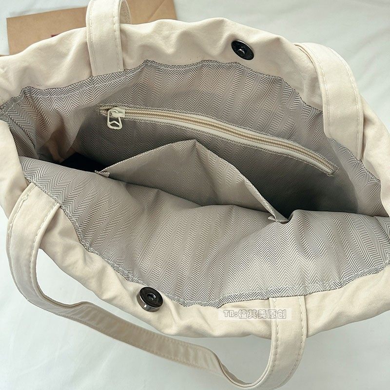 轻便防水尼龙布包包女秋冬2025新款抽绳单肩托特包通勤上学装书包,淘宝优惠券,粉丝福利购,淘宝优惠卷