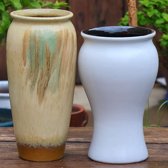 Ceramic simple stoneware flower pots are breathable and root-raising
