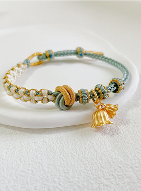 八股编酒窝桃花结手绳可穿转运珠