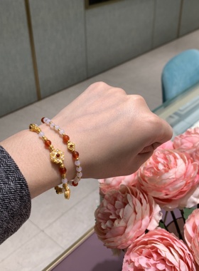 周大福传承宝相花黄金玉髓手链女