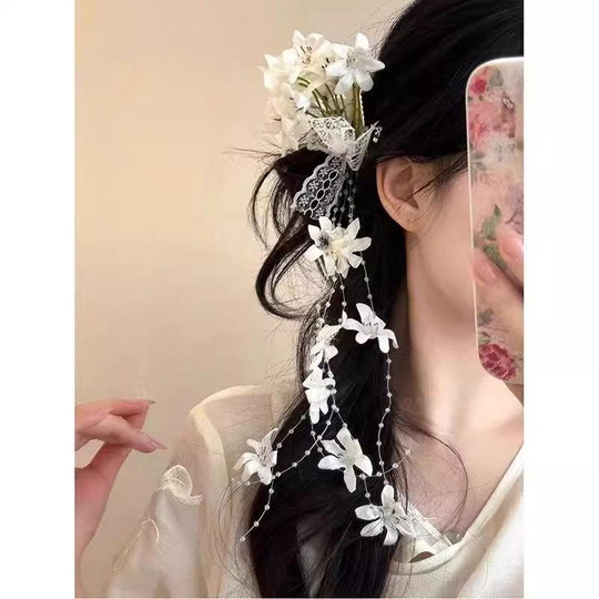 超仙仿真铃兰花流苏发夹女2025新款氛围感拍照侧边夹森系头花发饰