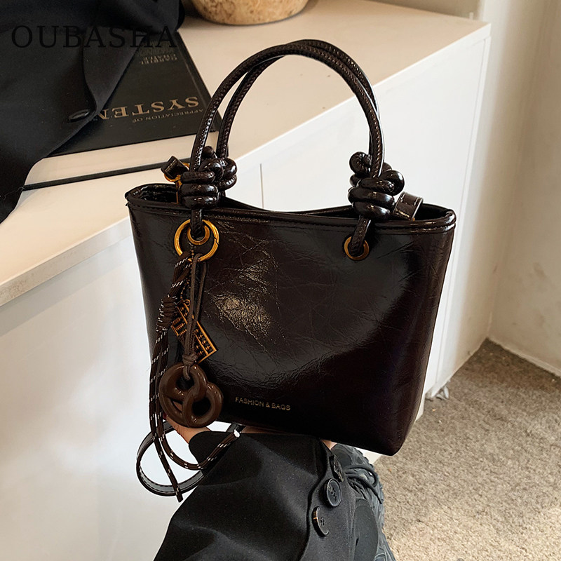 高级感超火小包包女式2025新款秋冬手提爆款水桶包轻奢小众斜挎包,淘宝优惠券,粉丝福利购,淘宝优惠卷