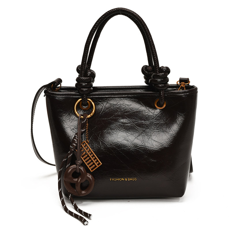 高级感超火小包包女式2025新款秋冬手提爆款水桶包轻奢小众斜挎包,淘宝优惠券,粉丝福利购,淘宝优惠卷