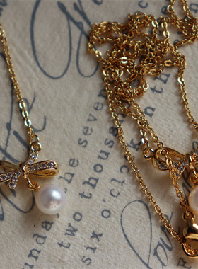 suu 轻奢小众蝴蝶结淡水珍珠吊坠项链锁骨链简约冷淡风珍珠颈链