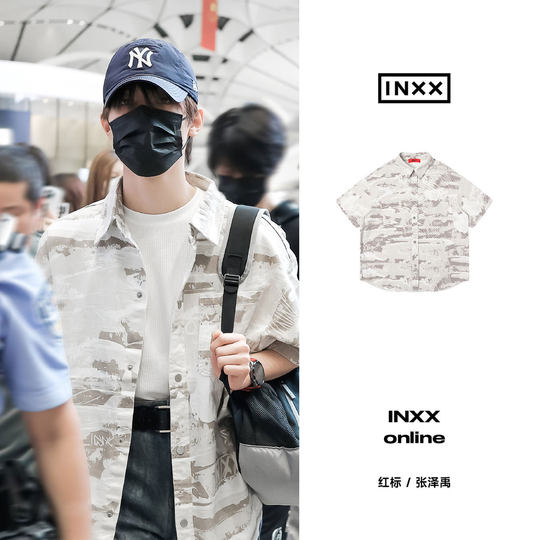 El mismo estilo que la camisa de mezclilla de la altura de la altura corta de la calle Celebrity Inxx