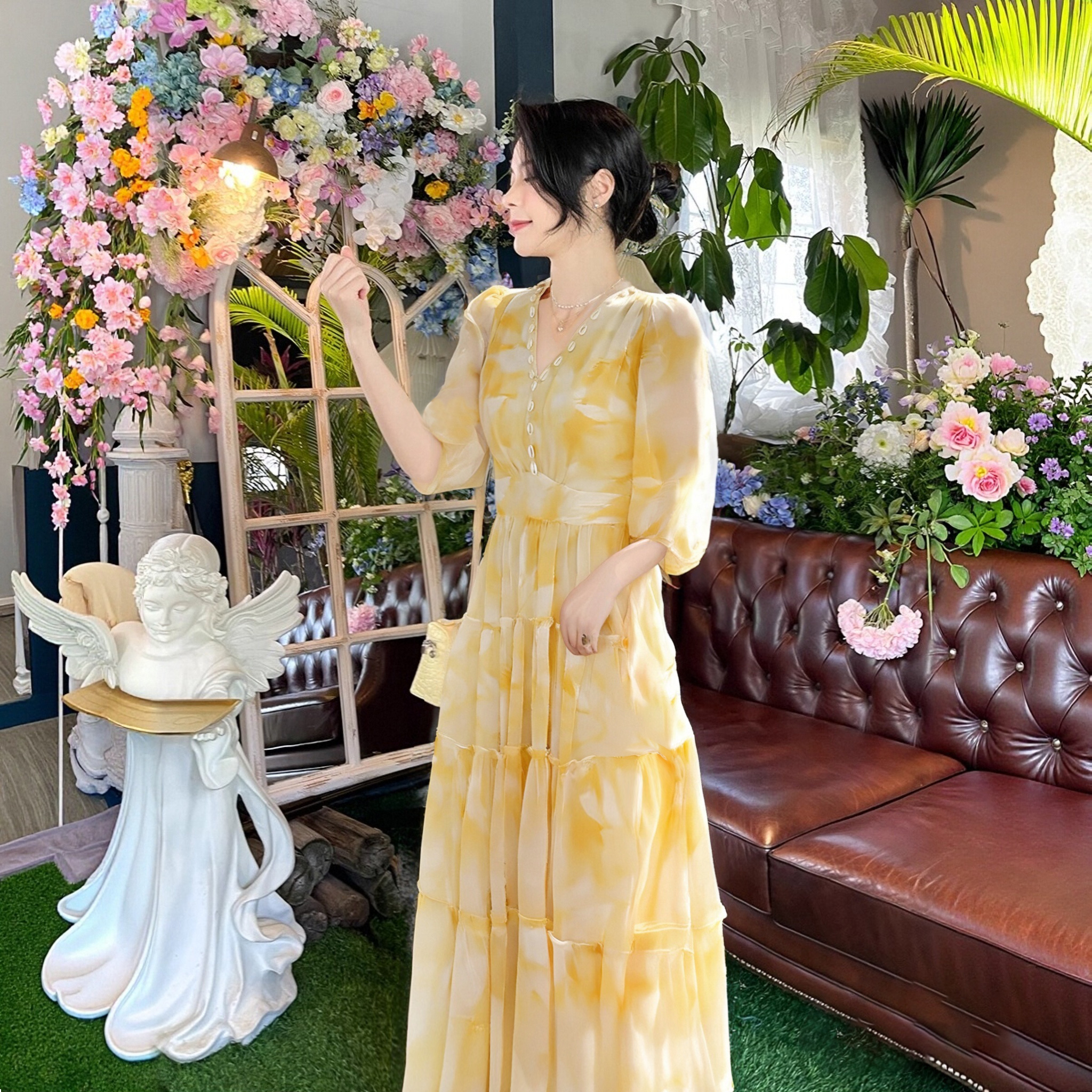 有里布2025新款夏季高端气质V领黄色印花度假连衣裙女装D1544A