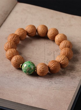 凤羽猴头核桃漆珠手串