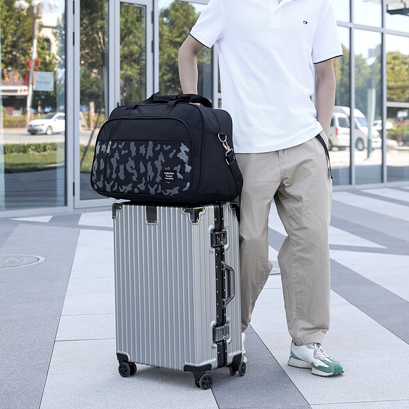时尚耐用手提旅行包男女通用行李袋大容量防水旅游健身包运动挎包