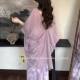 ລະດູຮ້ອນໃໝ່ປີ 2026 ແບບ retro V-neck lace-up mid-sleeve feminine age-reduced sun protection back cardigan shawl outer wear