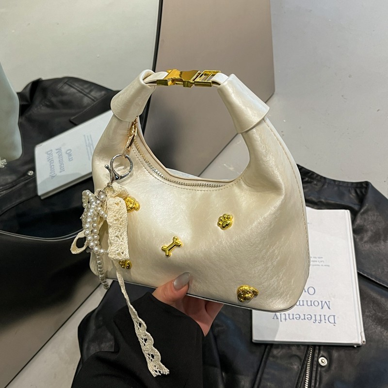 秋冬小众设计包包女式2025新款时尚百搭超火斜挎包爆款手提饺子包,淘宝优惠券,粉丝福利购,淘宝优惠卷