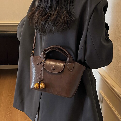 高级感小众设计包包女2026新款夏季百搭复古斜挎包超火手提饺子包 - 图1
