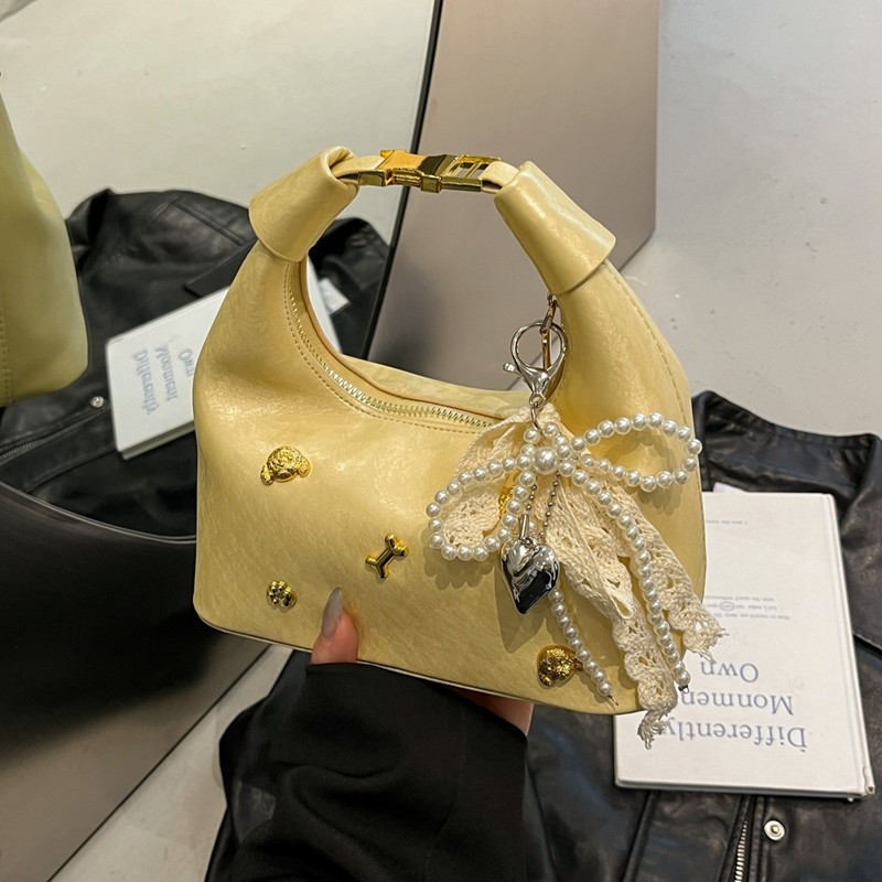 秋冬小众设计包包女式2025新款时尚百搭超火斜挎包爆款手提饺子包,淘宝优惠券,粉丝福利购,淘宝优惠卷