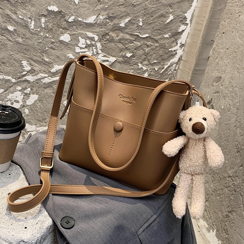 秋冬包包女斜挎包2025新款潮大容量单肩包大学生上课包简约水桶包,淘宝优惠券,粉丝福利购,淘宝优惠卷