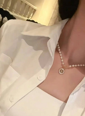 星语纽扣施家珍珠项链女款小众配饰毛衣链夏季轻奢高级感颈链饰品