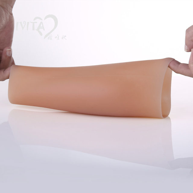 Silicone calf plumping leg sleeves to modify scars and cover the sleeves