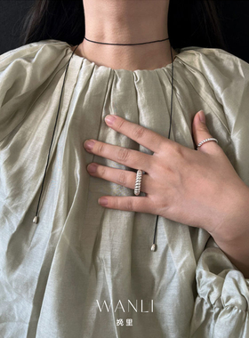 挽里铜镀白金黑绳毛衣链小众设计