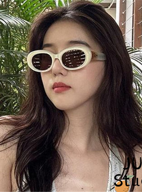 高级感珍珠白墨镜椭圆形2023