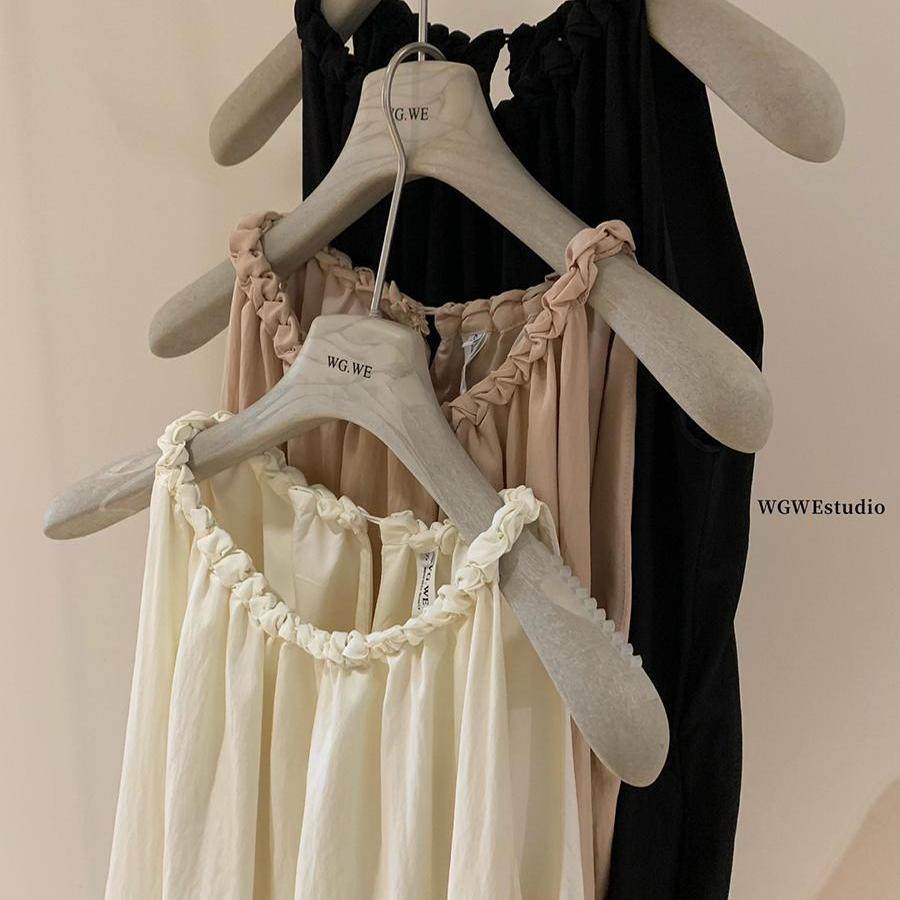 法式极简风纽结麻花挂脖连衣裙女秋打底吊带裙宽松气质度假风长裙,淘宝优惠券,粉丝福利购,淘宝优惠卷