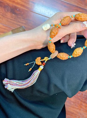 新款橄榄核九尾手链女搭配磷镁矿象牙果菩提根跑环檀香蝴蝶结