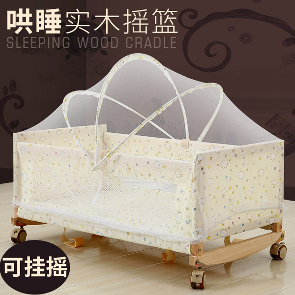 wooden cradle with mosquito net