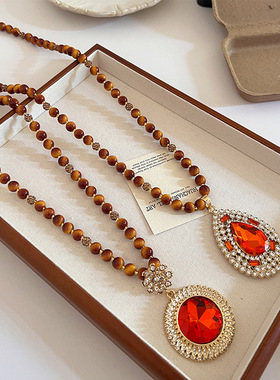 奢华虎眼石女高级感新中式国风复古民族风旗袍长款毛衣链串珠配饰