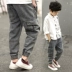 Quần áo bé trai quần jean 2019 mùa xuân mới trong quần trẻ em nước ngoài lớn Quần yếm trẻ em mùa xuân và mùa thu Hàn Quốc - Quần