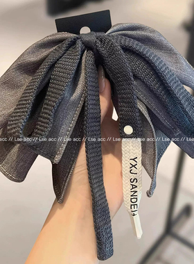 牛仔灰蝴蝶结质感抓夹