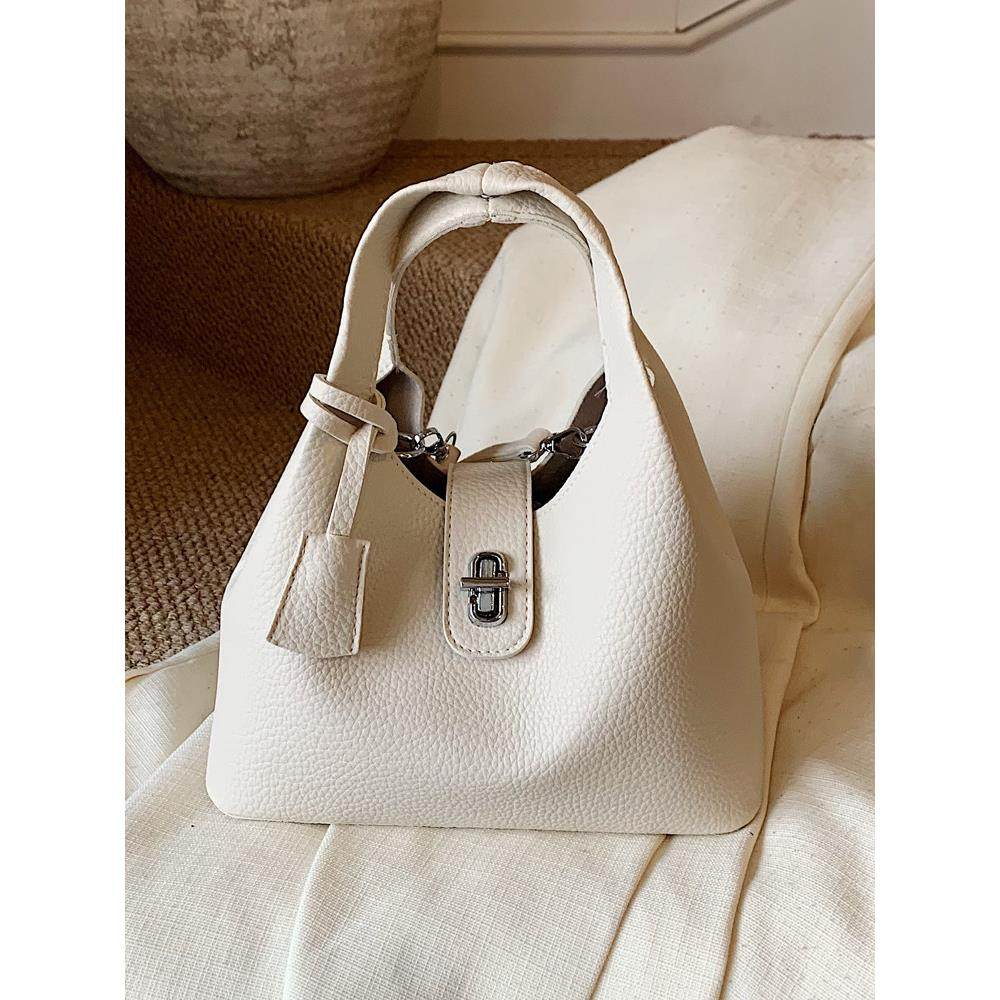 韩版复古手提水桶包女2025冬季新款日常休闲单肩包小众通勤斜挎包,淘宝优惠券,粉丝福利购,淘宝优惠卷