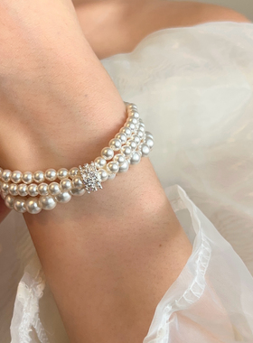 曼塔玫瑰施家珍珠三层叠戴手链