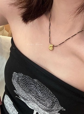 银螺秘语黑绳海螺项链